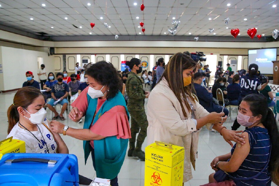  People receive their COVID-19 jabs during the National Vaccination Days part 4, at the Philippine Medical Association (PMA) headquarters in Quezon City on March 10, 2022. Jonathan Cellona, ABS-CBN News