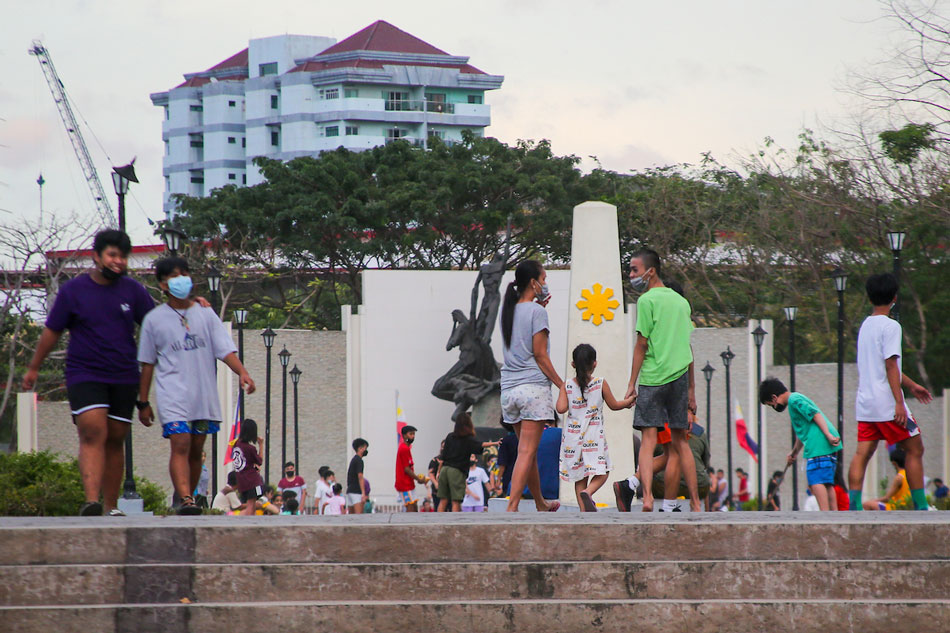 People spend time and exercise outdoors as the capital region remains under the loosest COVID-19 alert level on March 10, 2022 at the Pinagbuhatan Shrine in San Juan City. Jonathan Cellona, ABS-CBN News