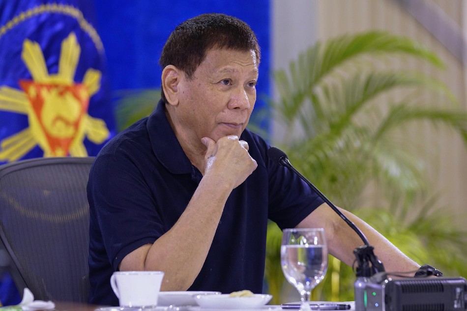 President Rodrigo Duterte presides over a meeting with key government officials prior to his 