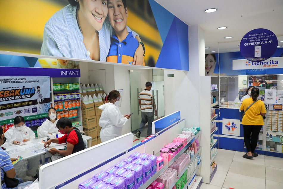 A local pharmacy opens its door for the 5-day trial of DOH’s “Resbakuna sa mga Botika,”on January 20, 202, in an attempt to strengthen COVID-19 vaccination efforts in the country. Jonathan Cellona, ABS-CBN News]