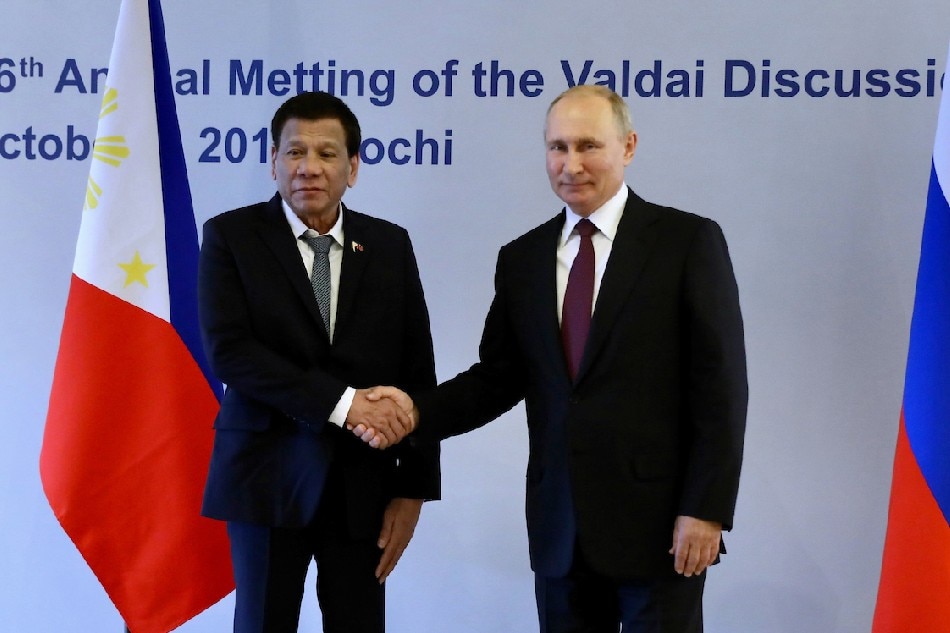 President Rodrigo Roa Duterte and Russian President Vladimir Putin pose for a photo at the start of the 16th Annual Meeting of the Valdai Discussion Club at the Polyana 1389 Hotel in Sochi on Oct. 3, 2019. Richard Madelo, Presidential Photo/File
