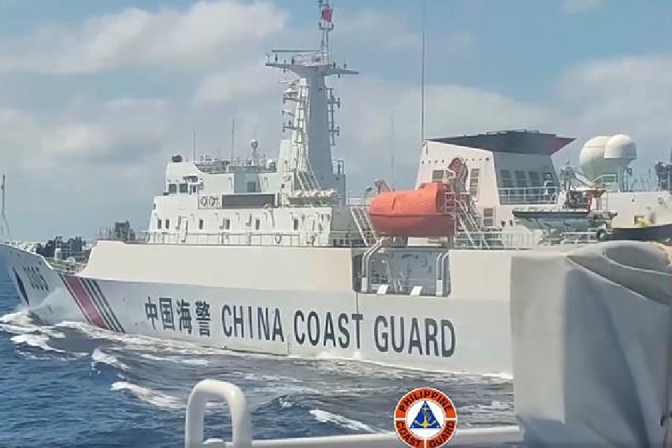 A vessel of the Chinese Coast Guard sails close to the Philippines' BRP Malabrigo in the disputed Bajo de Masinloc (Scarborough Shoal) on March 2, 2022. Courtesy: Philippine Coast Guard Facebook page/screengrab