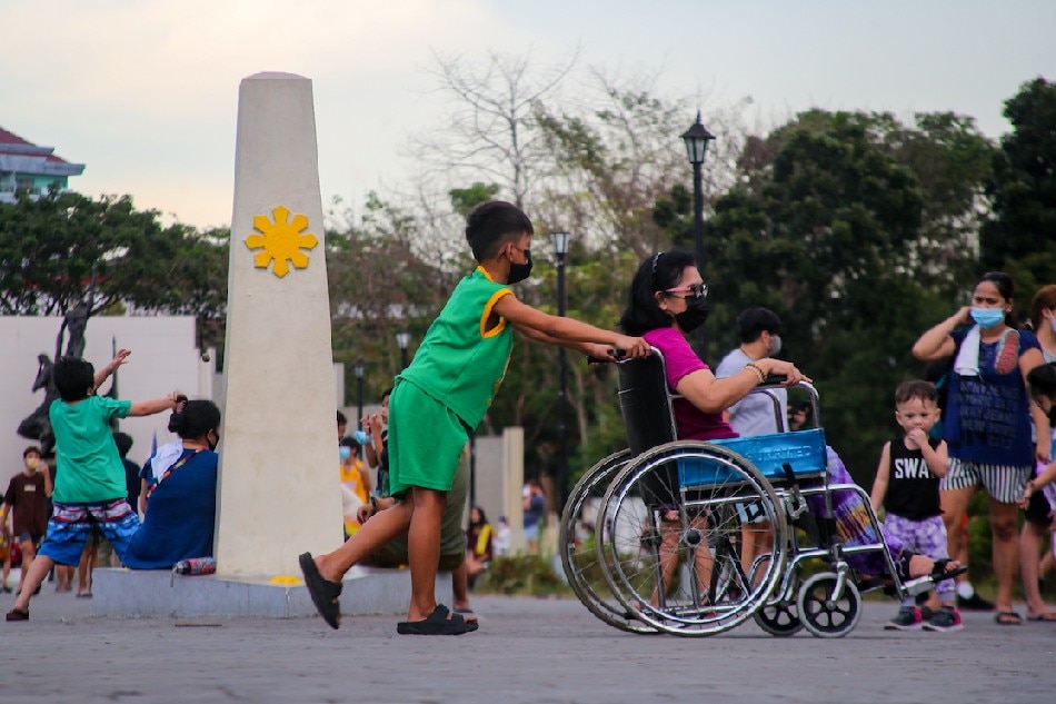 People spend time and exercise outdoors as the capital region remains under the loosest COVID-19 alert level on March 10, 2022 at the Pinagbuhatan Shrine in San Juan City. Jonathan Cellona, ABS-CBN News