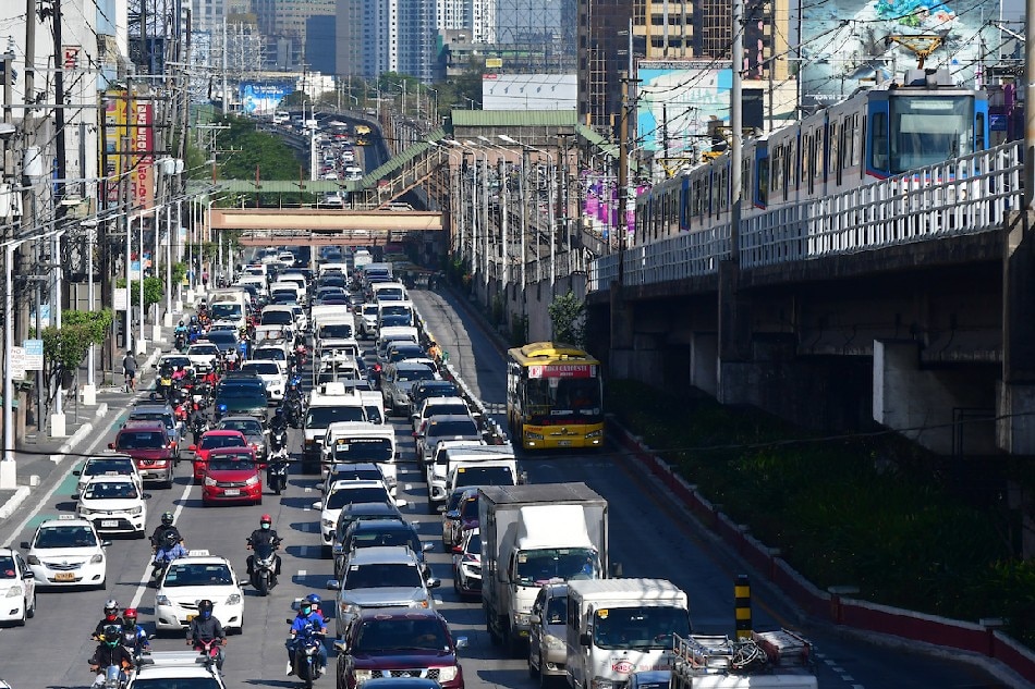 Traffic builds up along EDSA in Quezon City on March 3, 2022, as Metro Manila eased into alert level 1. Mark Demayo, ABS-CBN News