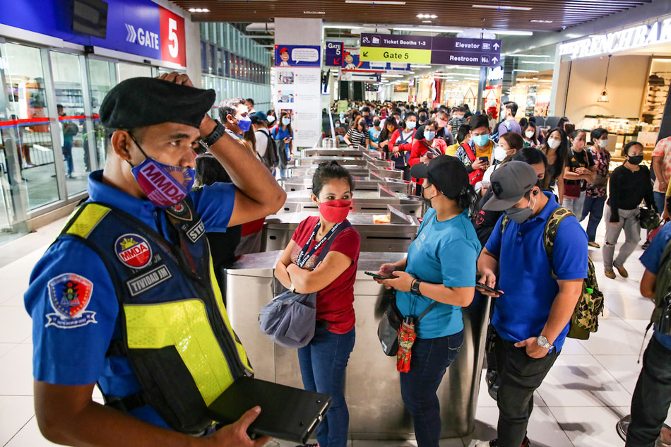 Passengers line up to take their designated bus trip going to various cities in Metro Manila and adjacent provinces at the Parañaque Integrated Terminal Exchange ( PITX ) in Parañaque City on April 11, 2022. Jonathan Cellona, ABS-CBN News