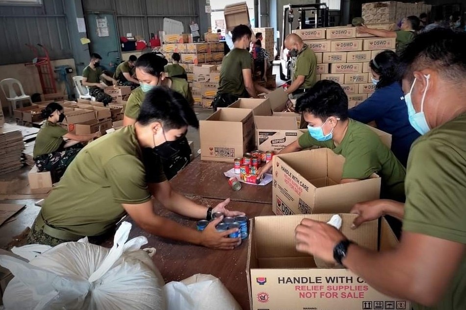 Army personnel and reservists repack relief goods for distribution on April 14, 2022. Courtesy of 604th & 804th Ready Reserve Infantry Battalion, PA