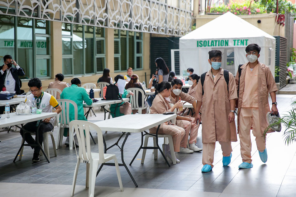 Students at the school grounds of the Far Eastern University in Manila on Feb. 23, 2022. George Calvelo, ABS-CBN News/File 