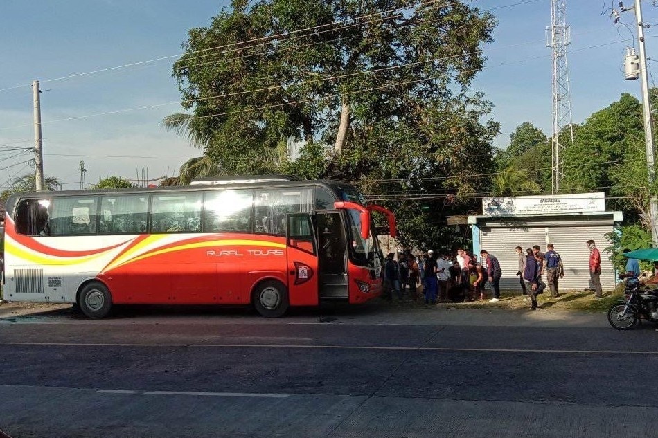 Authorities assist passengers who were hurt after a bomb exploded in the bus they were riding in Parang, Maguindanao on April 24, 2022. Courtesy: Soler Patoguina Daligdigan