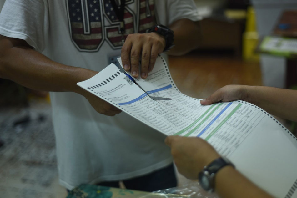 Teachers and volunteers destroy remaining excess ballots as they wrap up at a polling precicnt in Aurora A. Quezon elementary school in Manila on May 13, 2019. George Calvelo, ABS-CBN News/file