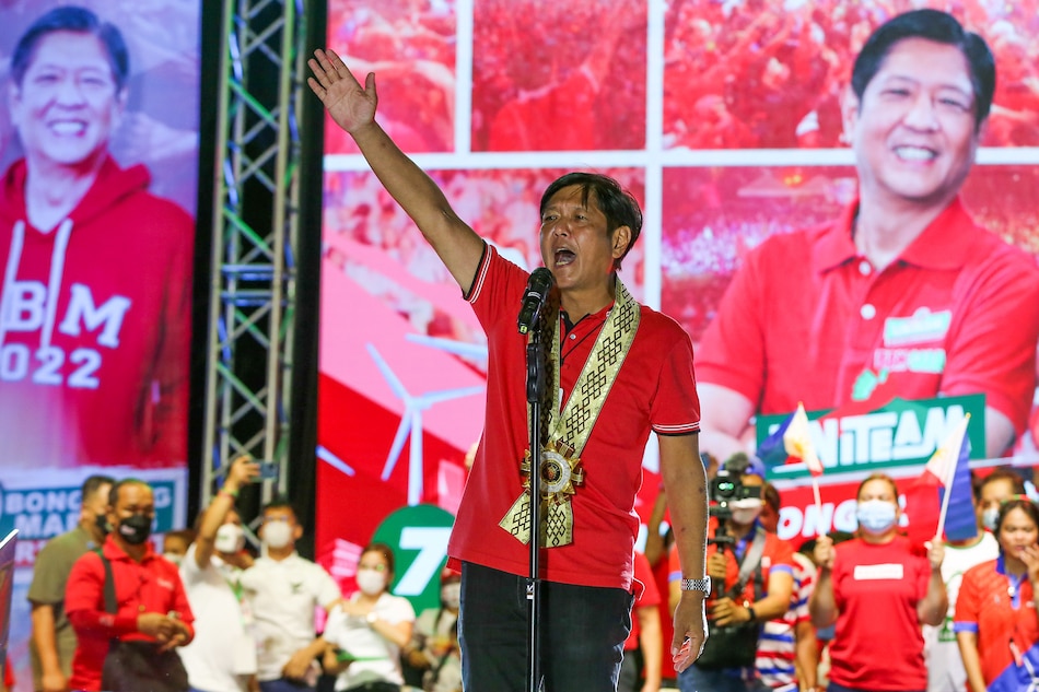 Presidential candidate Ferdinand Marcos Jr. greets supporters during a a grand rally at the Lima Commercial Estate along the border of Lipa and Malvar Batangas on April 20, 2022. Jonathan Cellona, ABS-CBN News