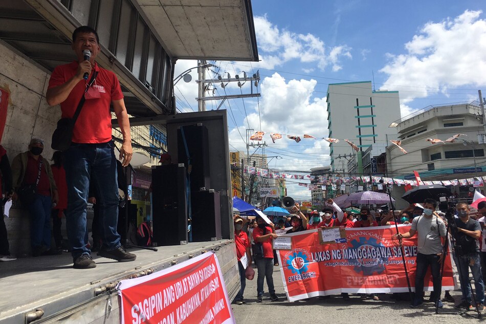 Partido Lakas ng Masa presidential candidate Leody de Guzman address the crowd at Bustillos, Manila with labor union leaders to call for the raise of wages and abolishment of contractualization. May 1, 2022. Photo by Josiah Antonio, ABS-CBN News.