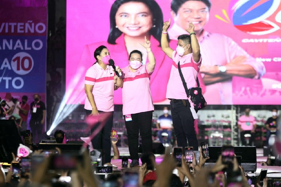 Vice President Leni Robredo joined by Sherwin and Tin Abdon on stage at the Dasmariñas rally for the Robredo-Pangilinan tandem on May 1, Sunday. (VP Leni Media Bureau)