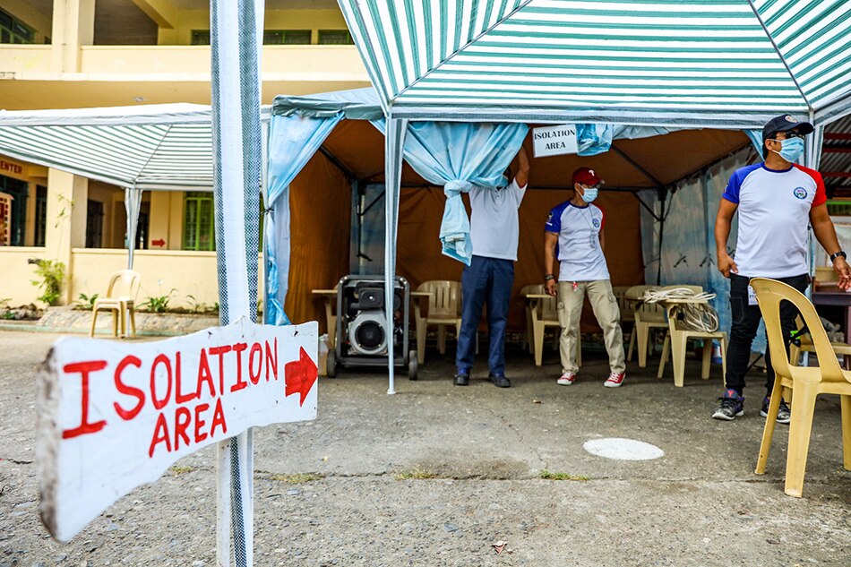 Local Brgy. watchmen stand guard at a voting precinct in Batac, Ilocos Norte a few days before Halalan 2022. May 7, 2022. Jonathan Cellona, ABS-CBN News.