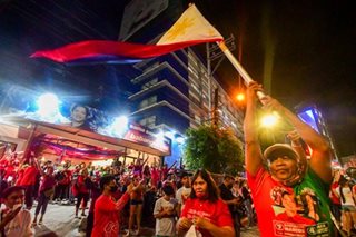 Supporters await Marcos outside HQ