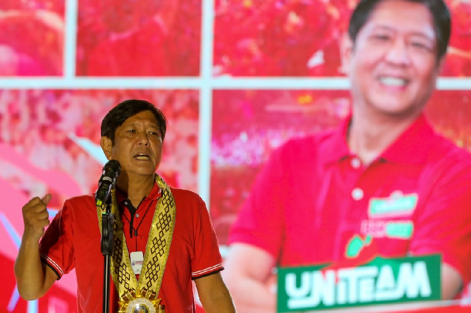 Presidential candidate Ferdinand Marcos Jr. greets supporters during a grand rally at the Lima Commercial Estate along the border of Lipa and Malvar Batangas on April 20, 2022. Jonathan Cellona, ABS-CBN News