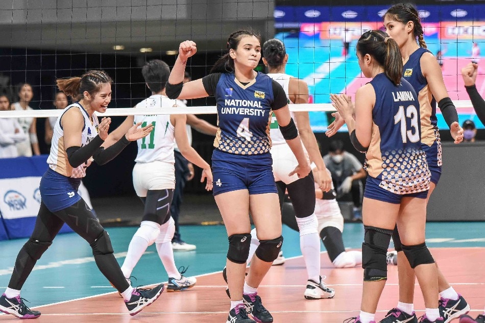 NU rookie Michaele Belen celebrates with her teammates after scoring against the De La Salle Lady Spikers in their UAAP Season 84 first round game. UAAP Media