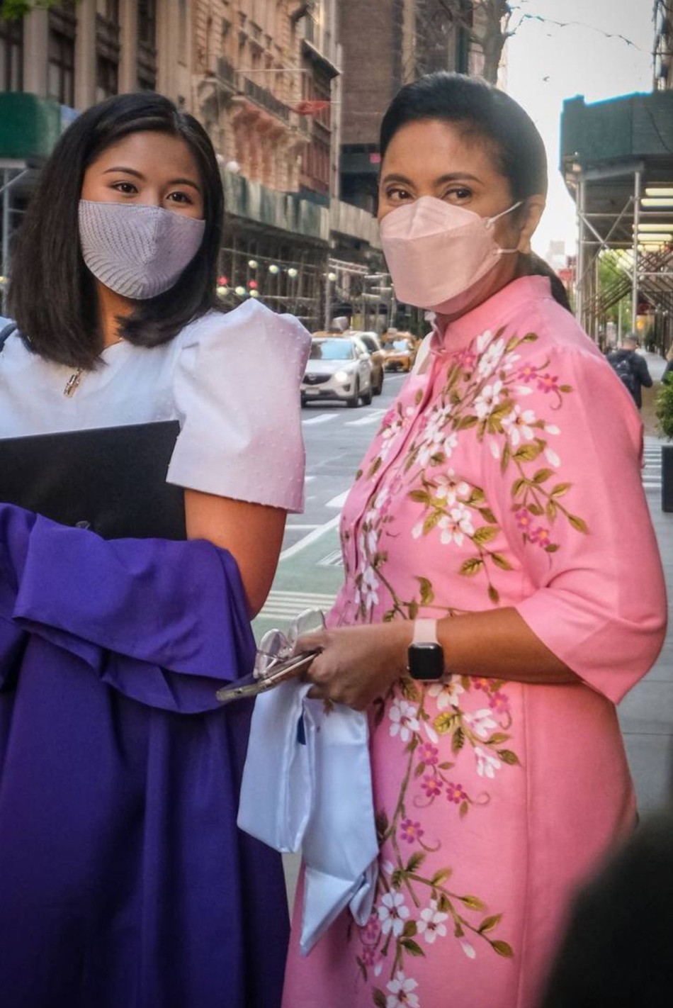 Vice President Leni Robredo wears a pink floral dress handwoven by locals of Argao, Cebu during her daughter Jillian's graduation from New York University on May 18, 2022. Courtesy: Leni Robredo/Instagram