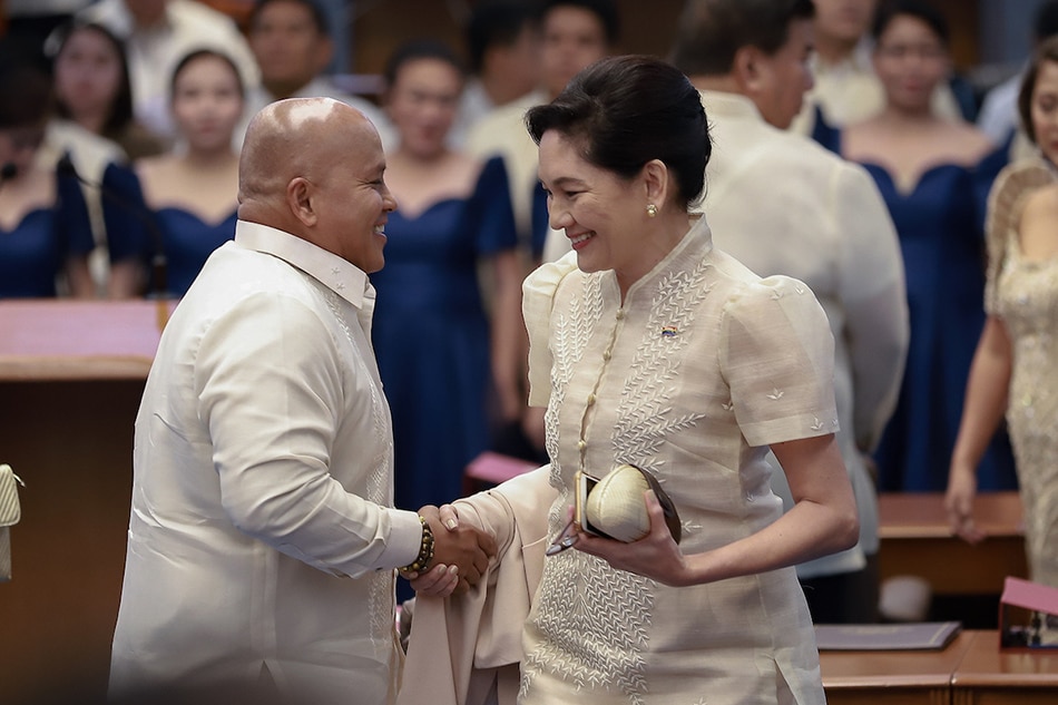 Senators Risa Hontiveros and Ronald 'Bato' de la Rosa exchange pleasantries during the opening of the 18th Congress at the Senate. Dela Rosa is a member of the PMA class of 1986, the same class Hontiveros’ late husband, Frank Baraquel, belonged to. PMA graduates from the same class and their spouses call each other mistah. Joseph Vidal, Senate PRIB