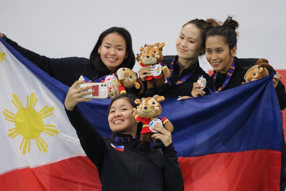 The team of Philippines pose with the silver medal during the award ceremony for the Women's Foil Team final at the 31st Southeast Asian Games (SEA Games 31) in Hanoi, Vietnam, 17 May 2022. Luong Thai Linh, EPA-EFE.