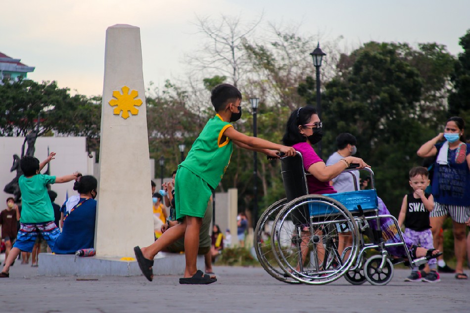  People spend time and exercise outdoors as the capital region remains under the loosest COVID-19 alert level on March 10, 2022 at the Pinagbuhatan Shrine in San Juan City. Jonathan Cellona, ABS-CBN News