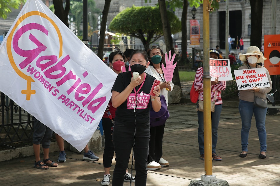 Women’s group Gabriela stage a noise barrage protest in front of the Commission on Elections headquarters in Intramuros, Manila on November 9, 2021. The group composed of women from different communities urged the COMELEC to junk the National Task Force to End Local Communism and Armed Conflict’s (NTF-ELCAC) nuisance disqualification case vs the women’s partylist. George Calvelo, ABS-CBN News