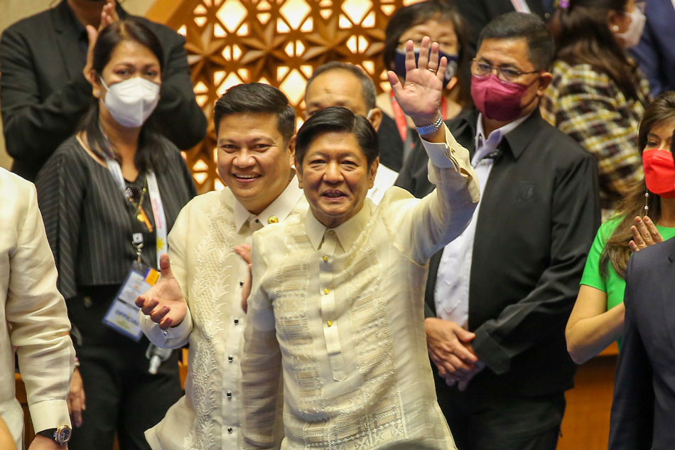 Ferdinand Marcos Jr. is proclaimed the president-elect of the Philippines during a formal ceremony officiated by Senate-president Vicente Sotto III (L) and House Speaker Lord Allan Velasco at the House of Representatives at the Batasan Pambansa in Quezon City on May 25, 2022. 
