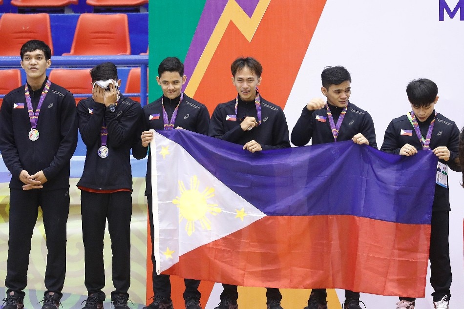 Members of team Philippines react on the podium after taking the second place in the team competition of the Artistic Gymnastics events at the 31st Southeast Asian Games in Hanoi, Vietnam, 13 May 2022. Luong Thai Linh, EPA-EFE