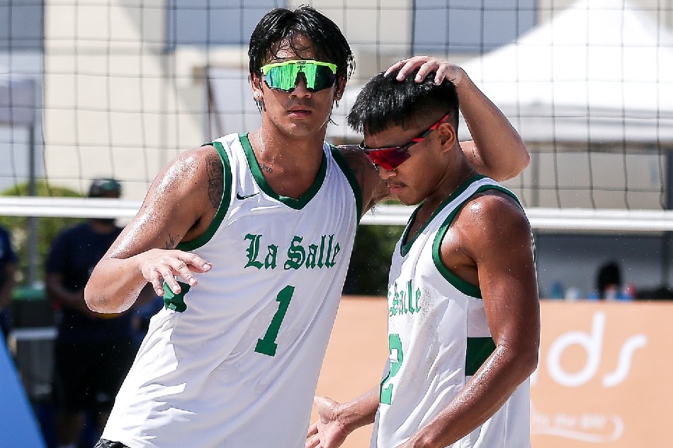 The DLSU pair of Noel Kampton and Vince Maglinao clinched a spot to the UAAP Season 84 men's beach volleyball Final 4. UAAP Media.
