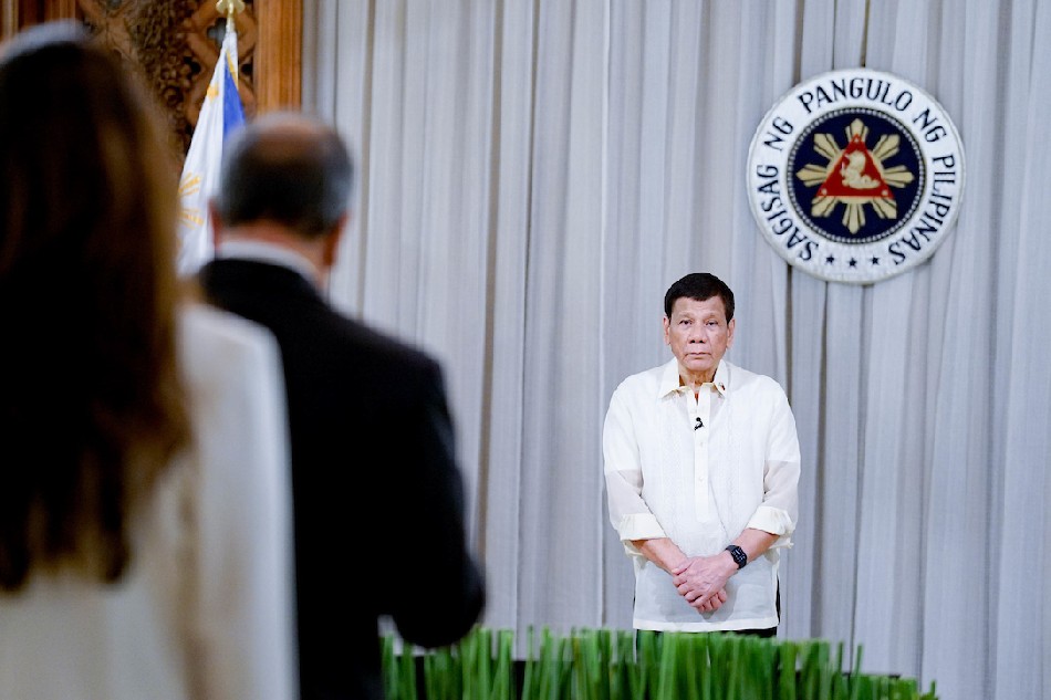 President Rodrigo Duterte listens to one of the resident Ambassadors Extraordinary and Plenipotentiary-designate to the Philippines during the presentation of credentials at the Malacañang Palace on May 25, 2022. King Rodriguez, Presidential Photo