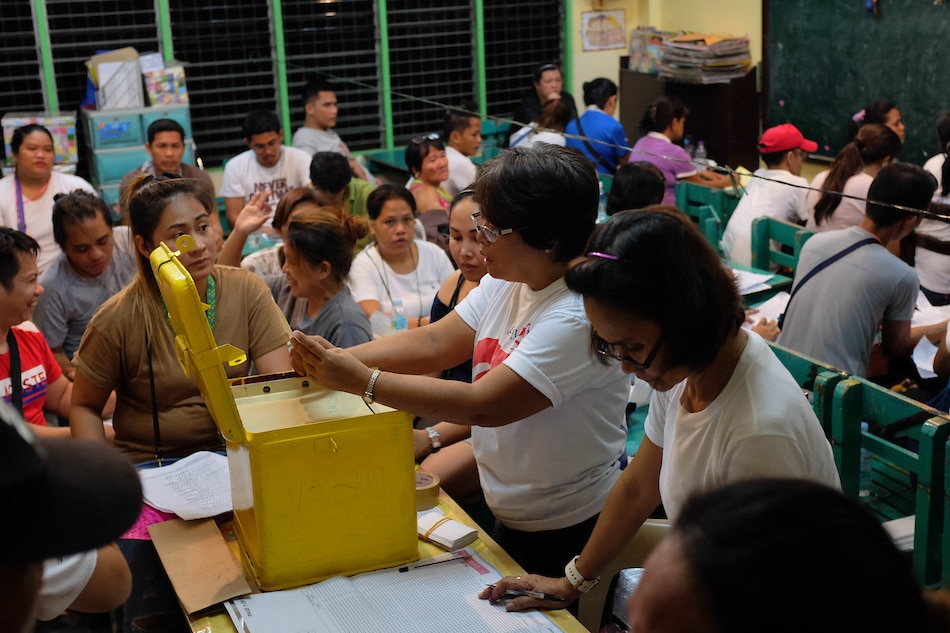 Poll officials canvas the votes for the Barangay and Sangguniang Kabataan (SK) elections at a precinct in Pasay on May 14, 2018. Filipinos trooped to polling precincts to elect barangay officials of almost 42,000 barangays nationwide. George Calvelo, ABS CBN News/File 