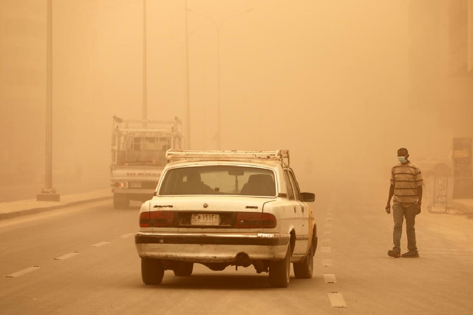 Vehicles drive along a street during a sandstorm in Baghdad, Iraq, on May 5, 2022. Ahmed Jalil, EPA-EFE/file