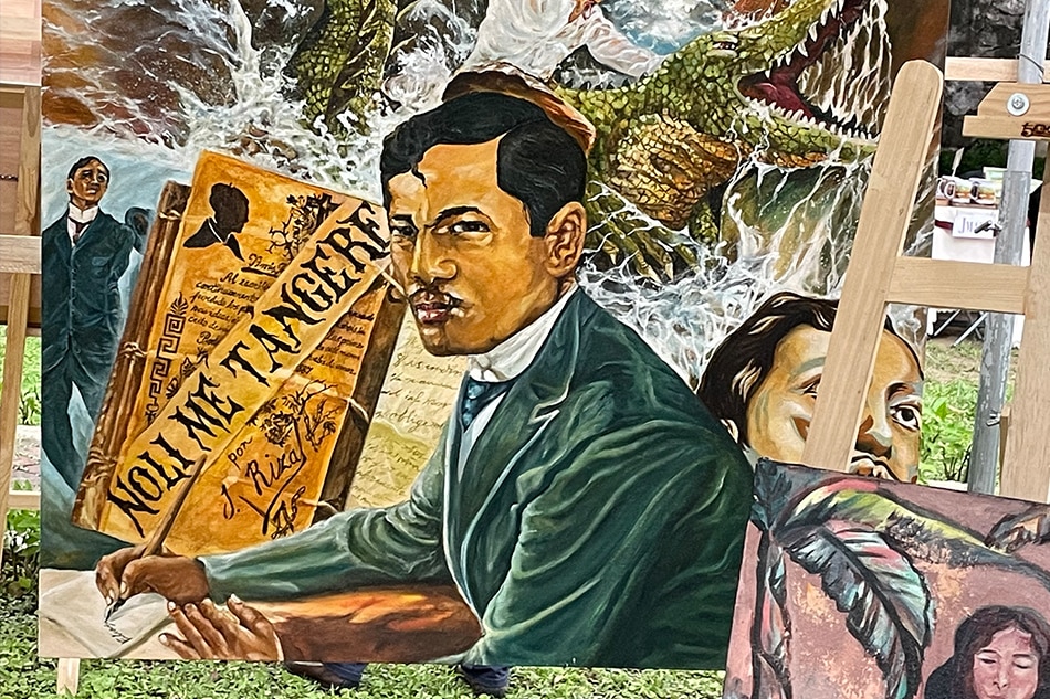 Scenes from Philippine hero Jose Rizal’s life, including his seminal novel Noli Me Tangere and his martyrdom are depicted in canvas at a paintings on display at the “Rizal Day Art Fair” in Fort Santiago, Intramuros, Manila from June 17 to 19, 2022 as part of Rizal’s 161st birth anniversary. Photo by Anjo Bagaoisan, ABS-CBN News
