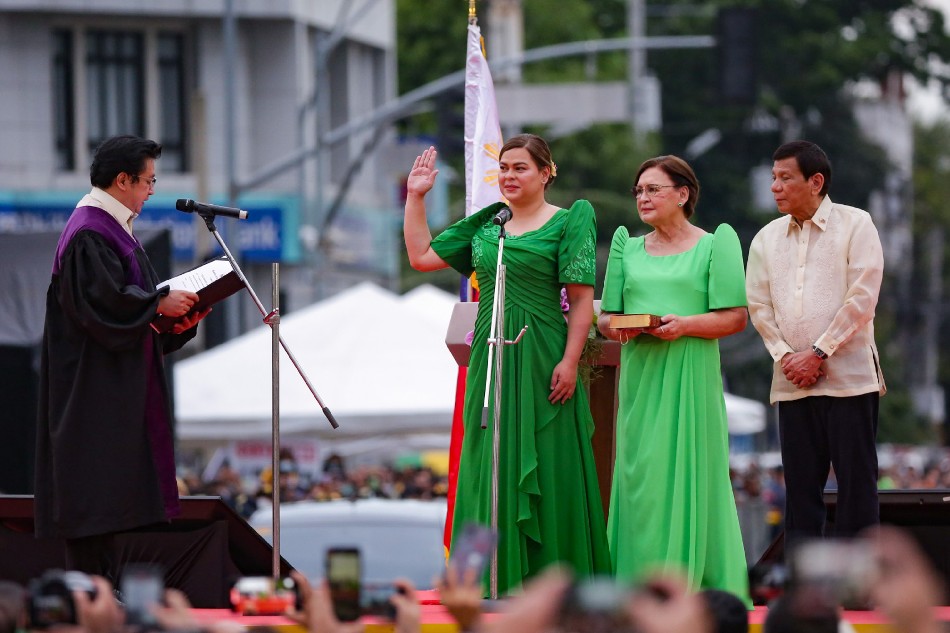 Vice President-elect Sara Duterte takes her oath as the 15th Vice President of the Philippines  at the San Pedro Square in Davao City on Jun 19, 2022. George Calvelo, ABS-CBN News