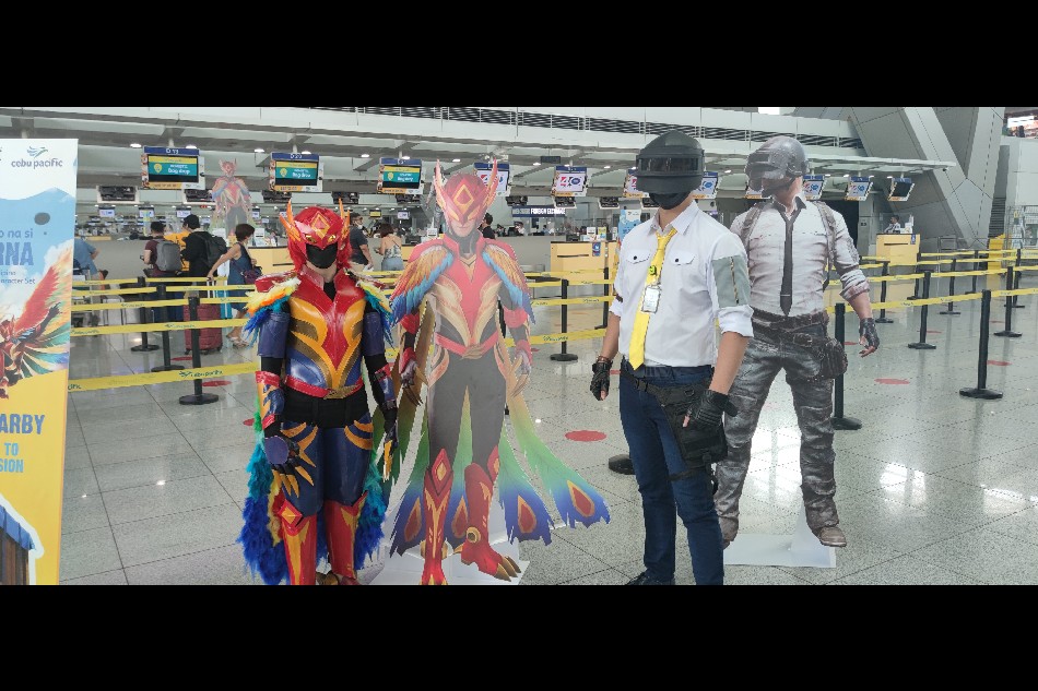 A part of NAIA Terminal 3 featured game-inspired check-in counters and cosplayers for PUBGM and Cebu Pacific