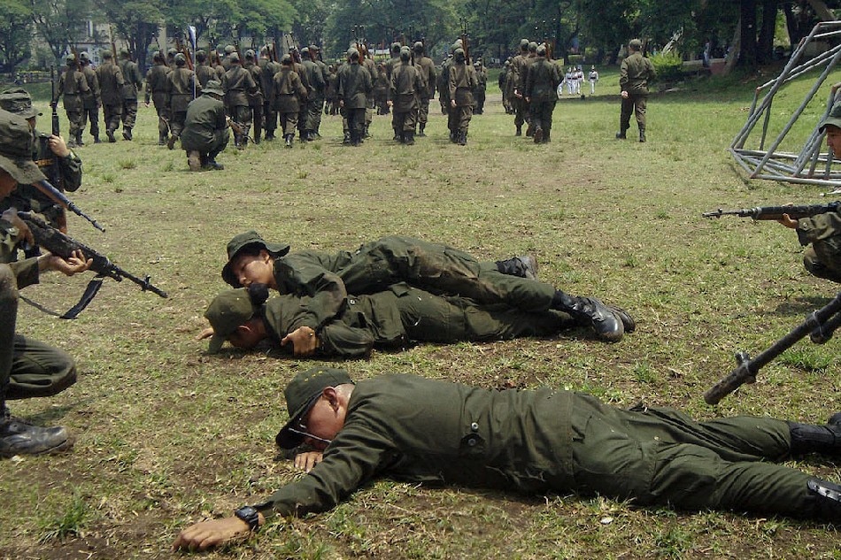 University of the Philippines (UP) students under the Reserved Officers Training Corps (ROTC) perform a military drill on April 30, 2017 at the Diliman campus in Quezon City. Manny Palmero, ABS-CBN News/File 