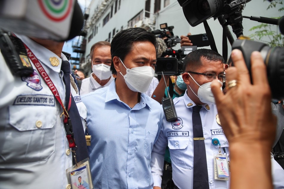 Jose Antonio Sanvicente is escorted by authorities as he emerges from the Hall of Justice in Mandaluyong City on June 23, 2022. Sanvicente appeared at the Mandaluyong Hall of Justice to submit his counter affidavit to a complaint filed by police regarding the hit-and-run incident involving a mall security guard last June 5, 2022 . Jonathan Cellona, ABS-CBN News