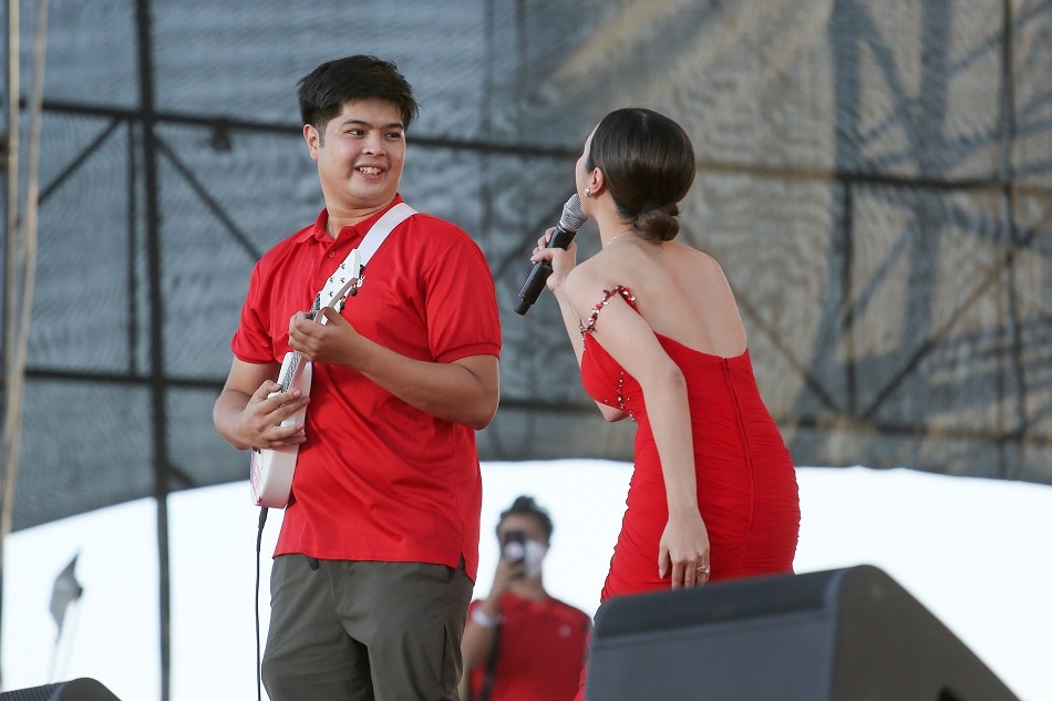 Vinnie Marcos, son of then-presidential candidate Bongbong Marcos, performs at the Marcos-Duterte UniTeam miting de avance in Parañaque City on May 7, 2022. Fernando G. Sepe Jr., ABS-CBN News/File