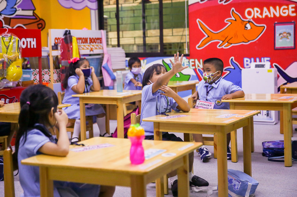 Kindergarten students attend classes inside the Jose Magsaysay Elementary School in Makati City on March 30, 2022. George Calvelo, ABS-CBN News/File
