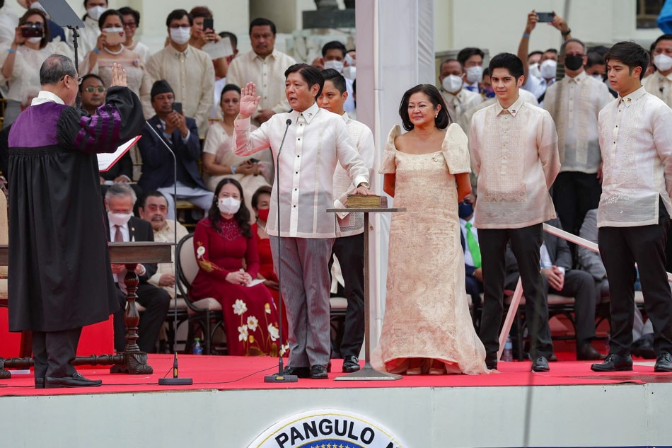 Ferdinand 'Bongbong' Marcos, Jr. takes his oath as the 17th President of the Philippines, administered by Chief Justice Alexander Gesmundo, at the National Museum in Manila City on Thursday. Marcos called on Filipinos to unite and work with his government to achieve a better future for the country. George Calvelo, ABS-CBN News