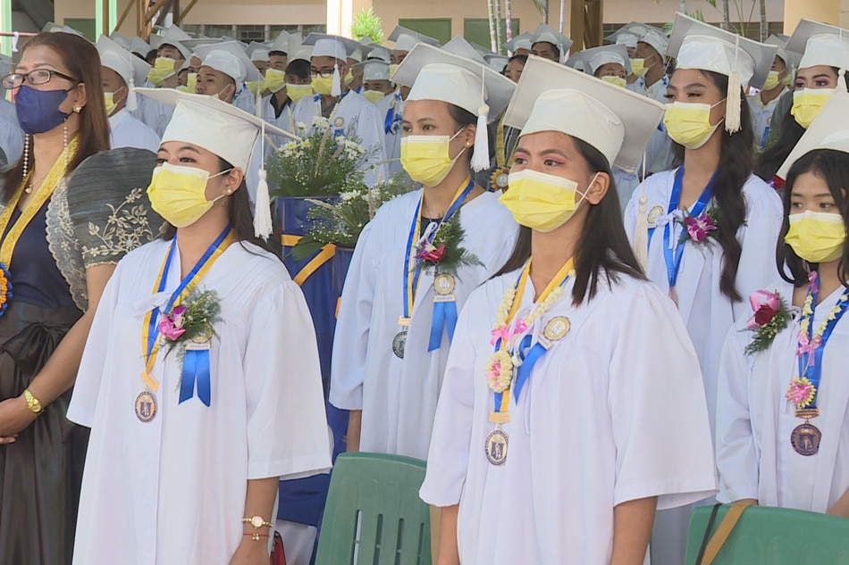 Some senior high school students graduate from the K-12 program at a high school in Quezon City. ABS-CBN News file photo