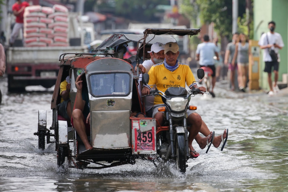 Residents wade through flood water ABS-CBN News