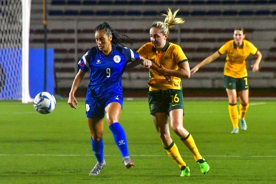 Philippines midfielder Jessica Miclat battles Australia's Mackenzie Hawkesby for control of the ball in their ASEAN Football Federation (AFF) Women's Championship match in Manila on July 4, 2022. Mark Demayo, ABS-CBN News