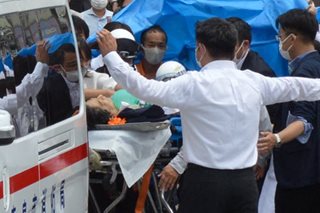 Chinese nationalists attack reporter over emotional Abe report