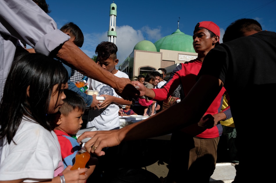 Musims in Marawi City share a meal at the provincial capitol during Eid al Fitr on June 25, 2017, as is customary to break the fasting after Ramadan. Fernando G. Sepe Jr., ABS-CBN News