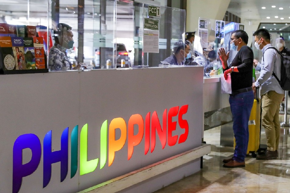 Foreign nationals arrive at the Ninoy Aquino International Airport in Pasay City on February 10, 2022, the first day the country reopened its borders to fully vaccinated international travelers. Jonathan Cellona, ABS-CBN News