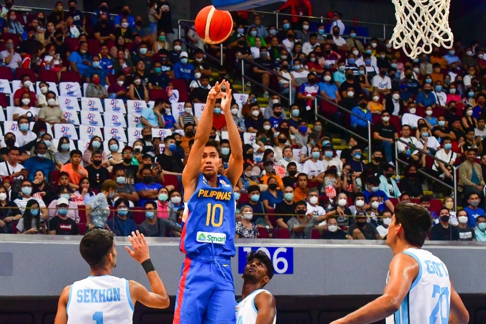 Gilas Pilipinas player Rhenz Abando (10) shoots a jump shot during their match against India in the FIBA World Cup Asian Qualifiers in Pasay City on July 3, 2022. Mark Demayo, ABS-CBN News