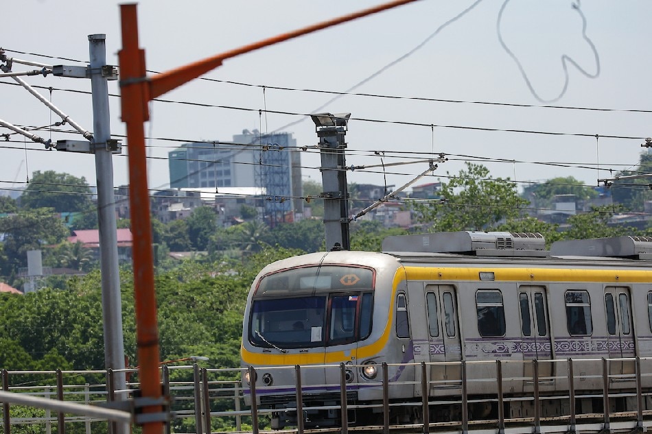 A train of the LRT-2 arrives at the Santolan station in Marikina City on May 27, 2022. George Calvelo, ABS-CBN News/File