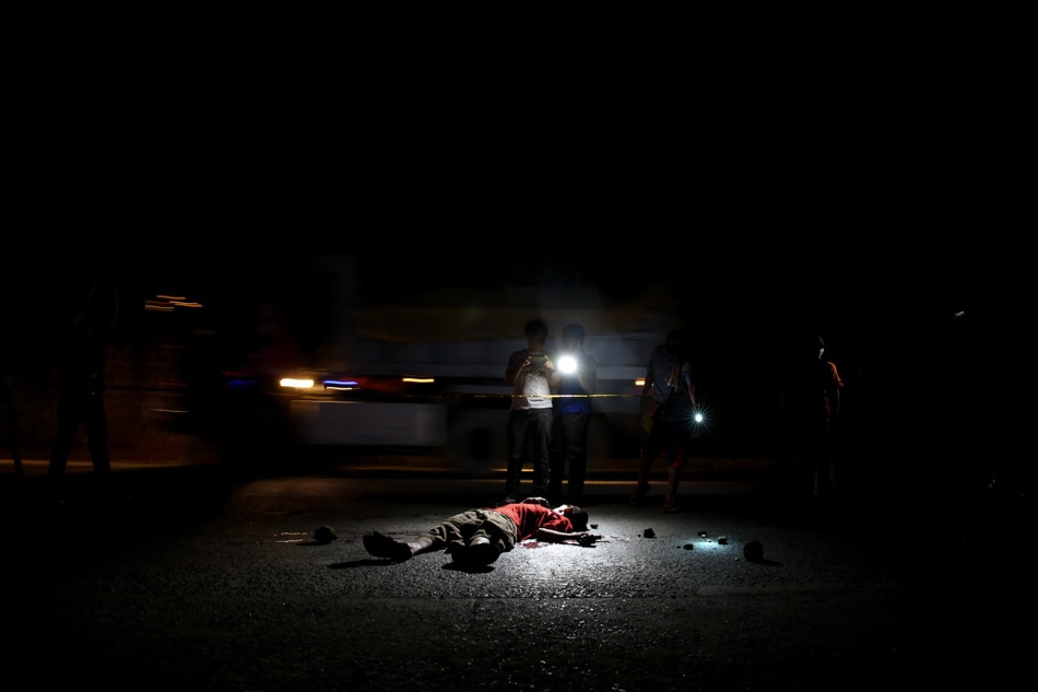 A man lies dead after he was gunned down in suburban Payatas in Quezon City on February 10, 2017 in an apparent vigilante killing related to the drug war. Fernando G. Sepe Jr. ABS-CBN News