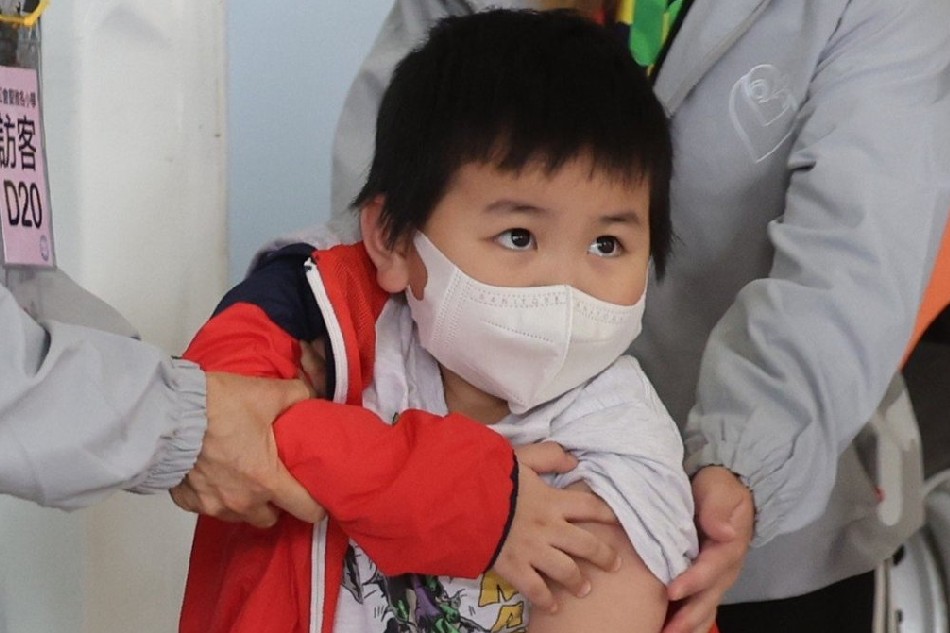 A source has said the government’s vaccine committee is set to approve reducing the age of coronavirus vaccine recipients in a meeting next month. Photo: May Tse, South China Morning Post