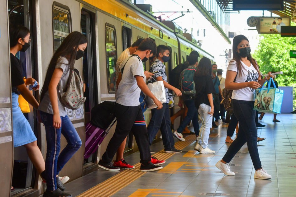 Commuters ride the LRT-2 on July 19, 2022. Mark Demayo, ABS-CBN News